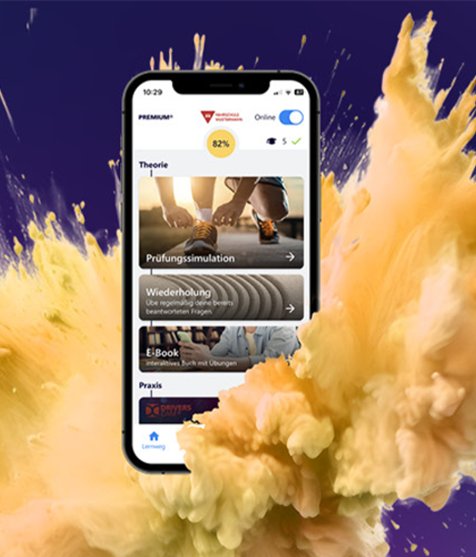 Smartphone mit Fahren Lernen in gelbem Farbnebel mit STERN Testsieger Badge
