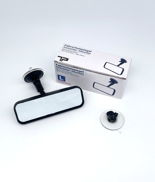 Fahrschulinnenspiegel mit Saugnapf Foto eines Fahrschulinnenspiegel mit Saugnapf vor der zugehörigen Verpackung mit Ersatzsaugnapf