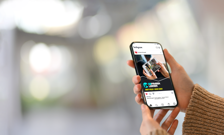 Instagram Post über GFL auf Smartphone in Hand